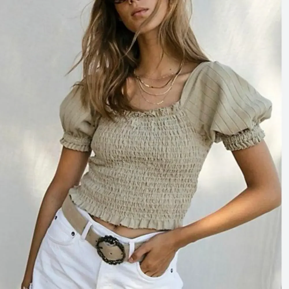 Free people oh hey smocked putt sleeve top in tan size Large